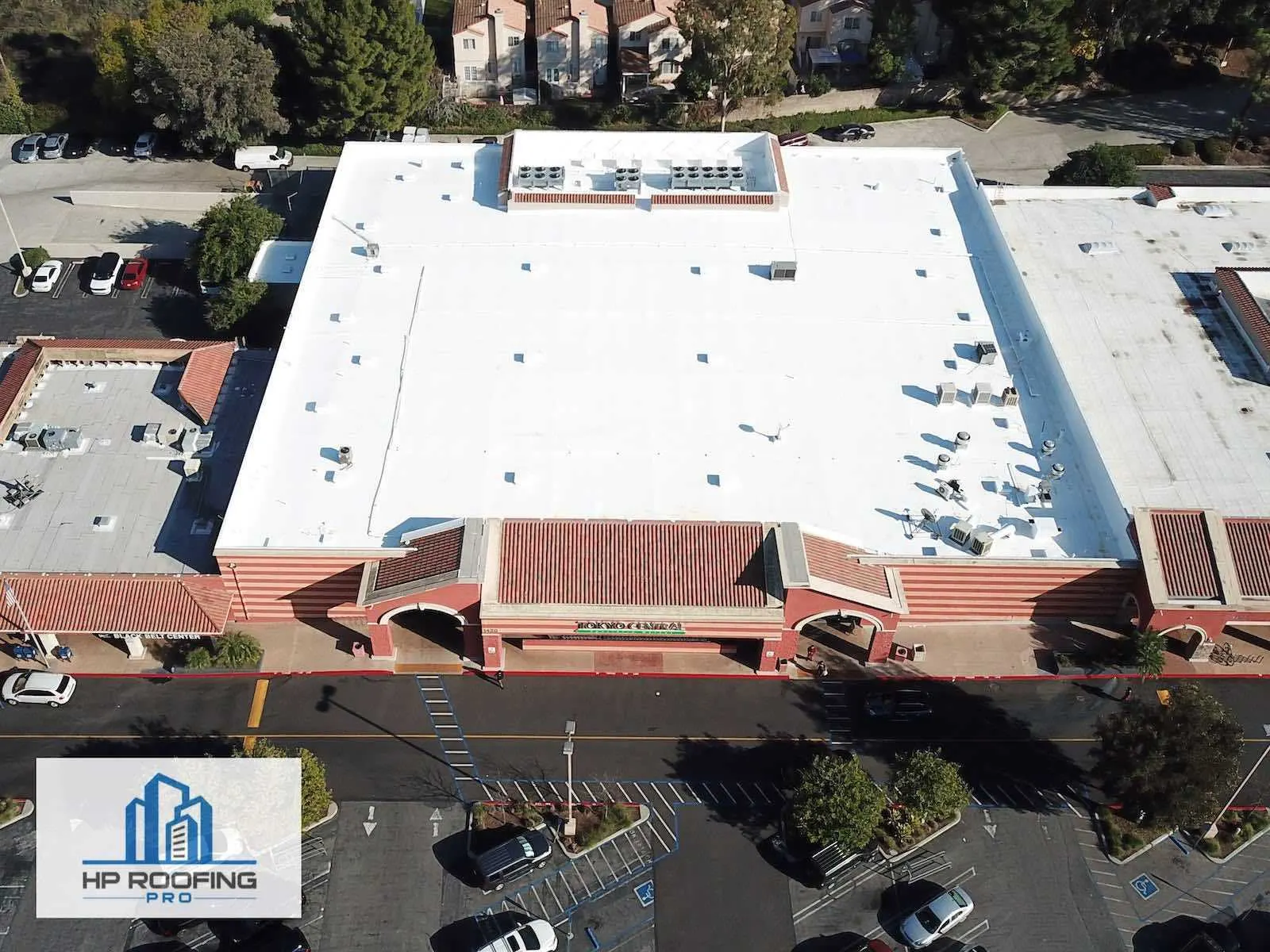 Commercial flat roof on a San Gabriel Valley warehouse — HP Roofing Pro service area